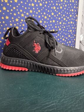 **U.S. Polo Assn. Black Sneakers with Red Accents**